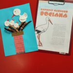 Jedna z prac plastycznych i kartka z opowiadaniem przypięta do podkładki z klipsem